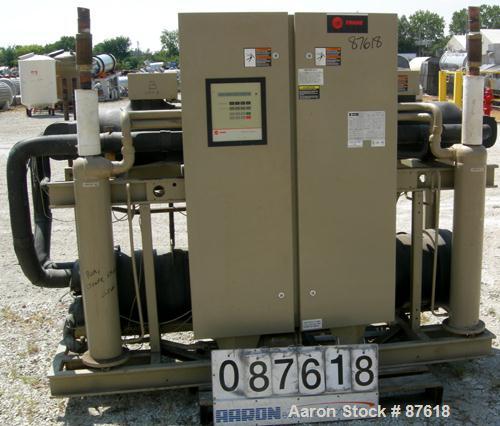 Used Trane Indoor Water Cooled Rotary Liquid Chiller, 100 Ton, Series R, Model RTUA1004XB01R300V. Temperature range 40 to 65 deg F. 3/60/460 volt. (2) 50 ton compressors, 450 psi high side, 300 psi l...