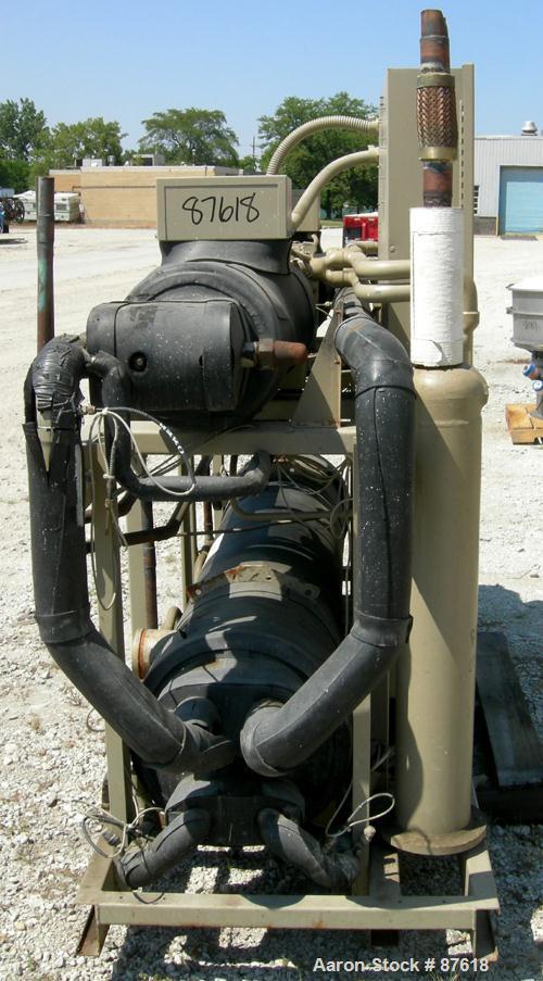Used Trane Indoor Water Cooled Rotary Liquid Chiller, 100 Ton, Series R, Model RTUA1004XB01R300V. Temperature range 40 to 65 deg F. 3/60/460 volt. (2) 50 ton compressors, 450 psi high side, 300 psi l...