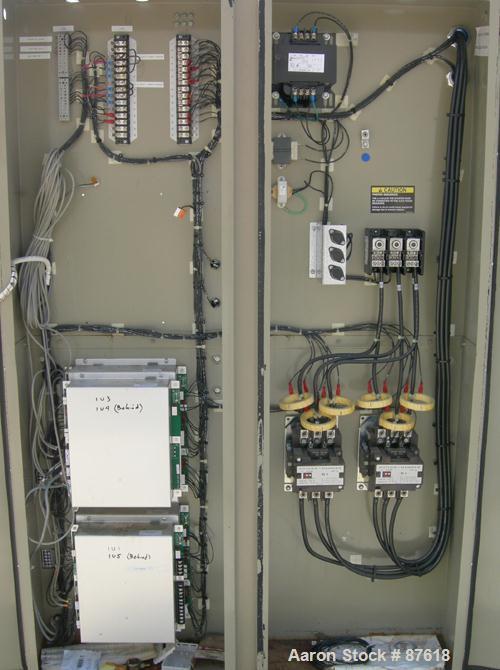Used Trane Indoor Water Cooled Rotary Liquid Chiller, 100 Ton, Series R, Model RTUA1004XB01R300V. Temperature range 40 to 65 deg F. 3/60/460 volt. (2) 50 ton compressors, 450 psi high side, 300 psi l...