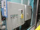 Used Chiller tank c/w pumps & (2) units on the roof