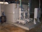 Used AEC Chiller, 1100 Gallons, Thermal Care (water cooled) with steel deck. Includes 80 ton and 100 ton cooling towers with stands, 10 ton (recep.); 50 ton scroll compressors; three fiberglass tank/...