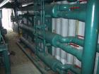 USED: Berg package water cooled chiller, 105 ton capacity,model WCS103-3X-HX, SN-W7541-0796. Copelametic Model 6DN3-3500TSE, SN CEF9612403. Unit is about 10 years old with very low hours and uses Fre...