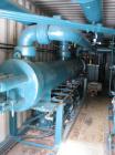 USED: Berg package water cooled chiller, 105 ton capacity,model WCS103-3X-HX, SN-W7541-0796. Copelametic Model 6DN3-3500TSE, SN CEF9612403. Unit is about 10 years old with very low hours and uses Fre...