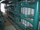USED: Berg package water cooled chiller, 105 ton capacity,model WCS103-3X-HX, SN-W7541-0796. Copelametic Model 6DN3-3500TSE, SN CEF9612403. Unit is about 10 years old with very low hours and uses Fre...
