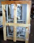 Unused- Budzar 15 Ton Water Cooled Chiller, Model LTW-15-FCB-70-S2S1. Nominally rated 70 gpm at 90' tdh. (2) Compressors, 5 hp circulation pump, condenser and plate heat exchanger, 65 gallon stainles...