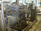 Used FES Rotary Screw Chiller, 40 Tons. Water cooled, single compressor with heat exchanger. Price includes 15% buyer's premium.