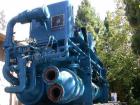 USED: TECO 300 ton chiller, natural gas driven, water cooled. Two compressors: engine A has 2143 hours, engine B has 2500 hours. Includes flat bed trailer it is sitting on.
