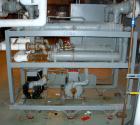 Used Thermalcare/Meyer Semi-Hermetic Central Chiller, 20 Ton, Model TPW20X, Water Cooled. 40 Degrees F. capacity 3/60/460 volt. (2) 10 hp compressors. Chilled water 65 gallons per minute. Requires 60...