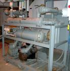USED: Thermalcare/Meyer semi-hermetic central chiller, 50 ton, model TPW50X, water cooled, 40 degrees F. Capacity 3/60/460 volt. (2) 25 hp compressors. Chilled water 65 gallons per minute. Requires 8...