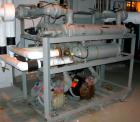 USED: Thermalcare/Meyer semi-hermetic central chiller, 50 ton, model TPW50X, water cooled, 40 degrees F. Capacity 3/60/460 volt. (2) 25 hp compressors. Chilled water 65 gallons per minute. Requires 8...