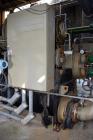 Used Trane CVHF CenTraVac Water Cooled Chiller, Model CVHF640, Approximate 640 Tons. R-123 Refrigerant, 3/60/460 volts. Includes an Adaptive Control panel. Serial# L00H04114.