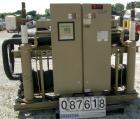 Used Trane Indoor Water Cooled Rotary Liquid Chiller, 100 Ton, Series R, Model RTUA1004XB01R300V. Temperature range 40 to 65 deg F. 3/60/460 volt. (2) 50 ton compressors, 450 psi high side, 300 psi l...