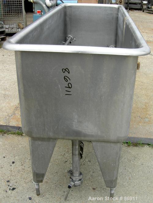 USED: Girton clean out of place washer, model PM6, 304 stainless steel. 170 gallon tank 24" wide x 76" long x 22" deep. (2) Distribution pipes, 2" end bottom outlet. Includes a Tri Clover centrifugal...