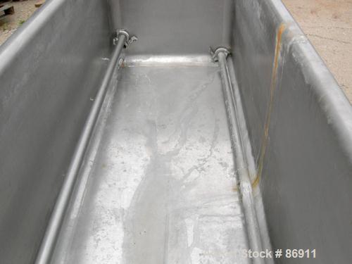 USED: Girton clean out of place washer, model PM6, 304 stainless steel. 170 gallon tank 24" wide x 76" long x 22" deep. (2) Distribution pipes, 2" end bottom outlet. Includes a Tri Clover centrifugal...