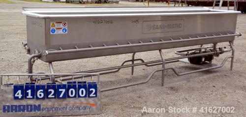 Used Sani-Matic Horizontal C.O.P. Tank, Model RW-12-10-N-NE-1, Approximate 275 Gallon, 304 Stainless Steel. Tank measures approximately 146" long x 24" wide x 21" deep. 2 1/2" sanitary bottom outlet....