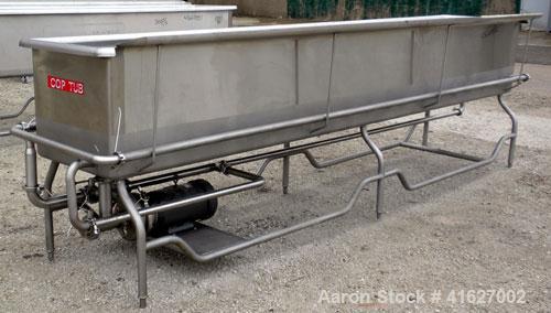 Used Sani-Matic Horizontal C.O.P. Tank, Model RW-12-10-N-NE-1, Approximate 275 Gallon, 304 Stainless Steel. Tank measures approximately 146" long x 24" wide x 21" deep. 2 1/2" sanitary bottom outlet....