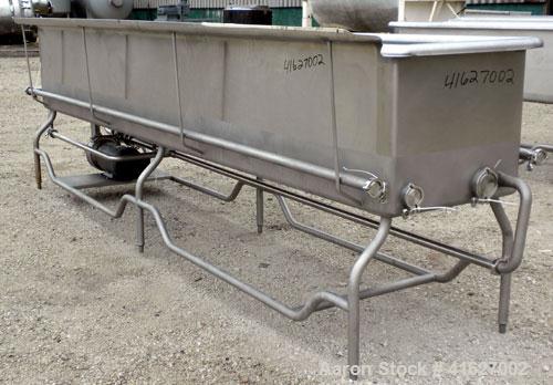 Used Sani-Matic Horizontal C.O.P. Tank, Model RW-12-10-N-NE-1, Approximate 275 Gallon, 304 Stainless Steel. Tank measures approximately 146" long x 24" wide x 21" deep. 2 1/2" sanitary bottom outlet....