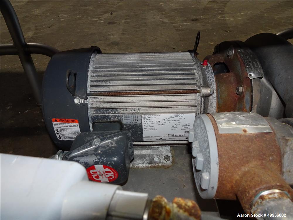 Used Sani-Matic Clean Out of Place Tank, Model RWJ-250.  Stainless Steel, Horizontal.  Trough approximate 120" long x 24" wide x 21" deep.  Includes 7.5 HP pump with electric heater, diaphragm pump, ...