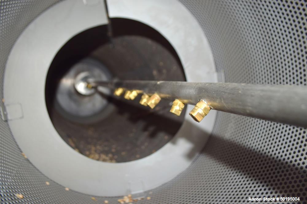 Used Coating Drum, Stainless Steel. Perforated drum approximate 23" diameter x 96" long, driven by an approximate 0.75hp gear motor. Top end feed hopper with a screw feeder driven by a 0.37kw gear mo...