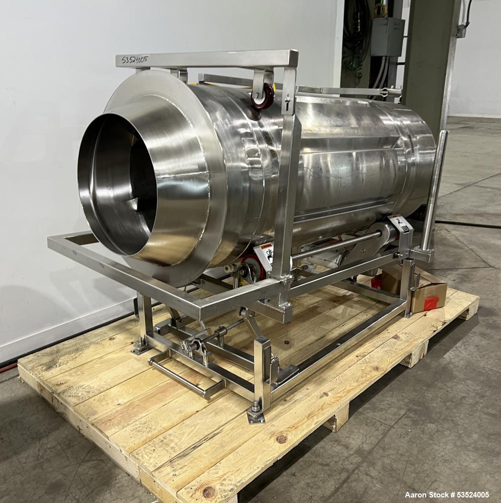 Used Stainless Steel Seasoning Drum. Approximate 30" diameter x 64" long. (8) Internal flights. Has adjustable pitch. 20" Inlet, 26" outlet. Driven by 1/2hp, 90 volt, 1750 rpm motor. Control panel. M...