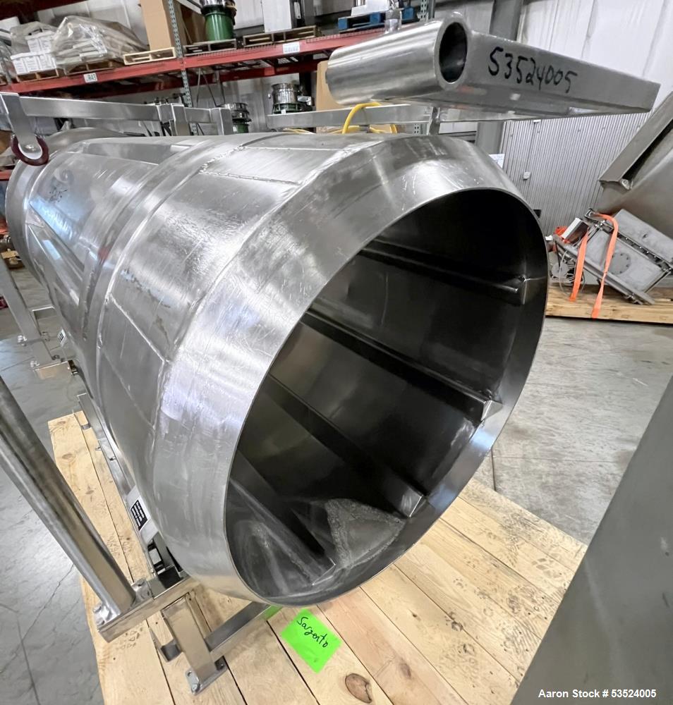 Used Stainless Steel Seasoning Drum. Approximate 30" diameter x 64" long. (8) Internal flights. Has adjustable pitch. 20" Inlet, 26" outlet. Driven by 1/2hp, 90 volt, 1750 rpm motor. Control panel. M...