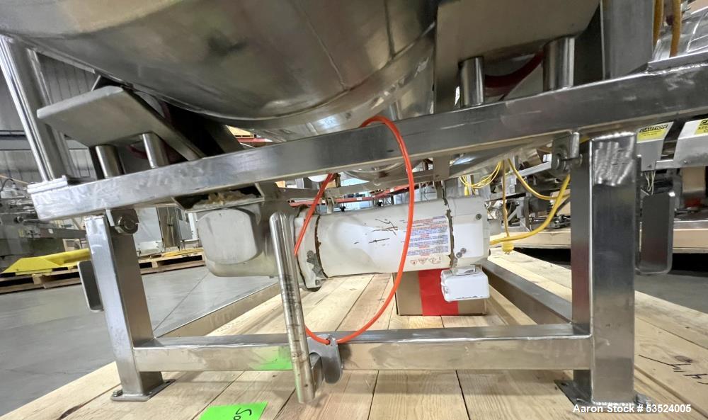Used Stainless Steel Seasoning Drum. Approximate 30" diameter x 64" long. (8) Internal flights. Has adjustable pitch. 20" Inlet, 26" outlet. Driven by 1/2hp, 90 volt, 1750 rpm motor. Control panel. M...