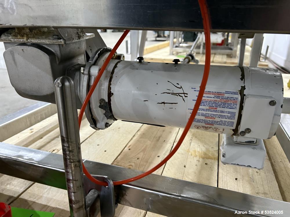 Used Stainless Steel Seasoning Drum. Approximate 30" diameter x 64" long. (8) Internal flights. Has adjustable pitch. 20" Inlet, 26" outlet. Driven by 1/2hp, 90 volt, 1750 rpm motor. Control panel. M...