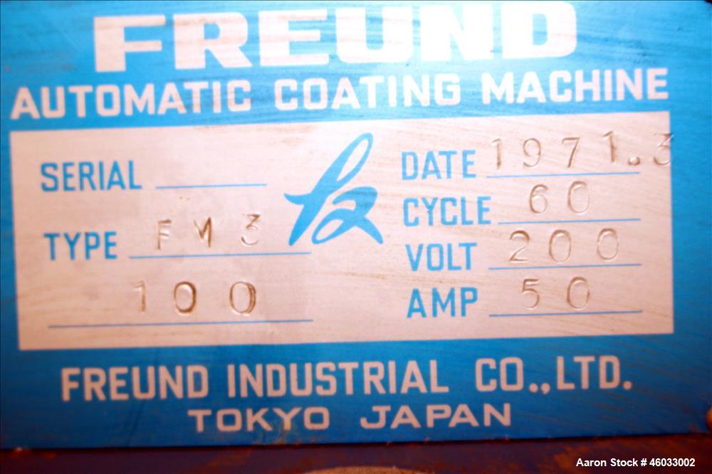 Used- Freund Industrial Co. P2 Automatic Coating Machine, Type FM3 100. Fiberglass pan 39" diameter x 31" deep with 19-3/4" ...