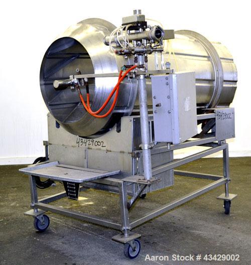 Used Spray Dynamite Rotary Drum Tumbler/Liquid Applicator, 304 Stainless Steel. 30" Diameter x 65" long horizontal drum with flights and lifters. 22-3/4" Diameter end feed opening with a 2" diameter ...