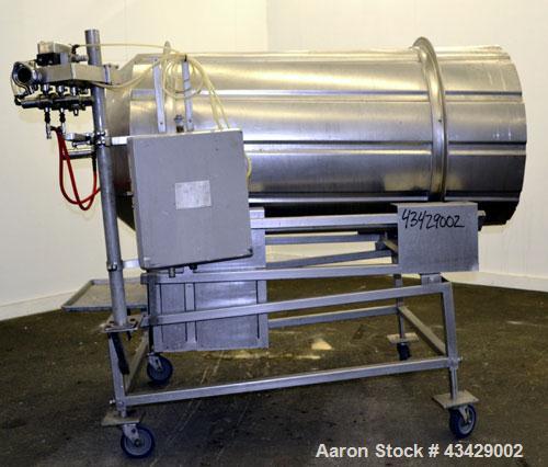 Used Spray Dynamite Rotary Drum Tumbler/Liquid Applicator, 304 Stainless Steel. 30" Diameter x 65" long horizontal drum with flights and lifters. 22-3/4" Diameter end feed opening with a 2" diameter ...