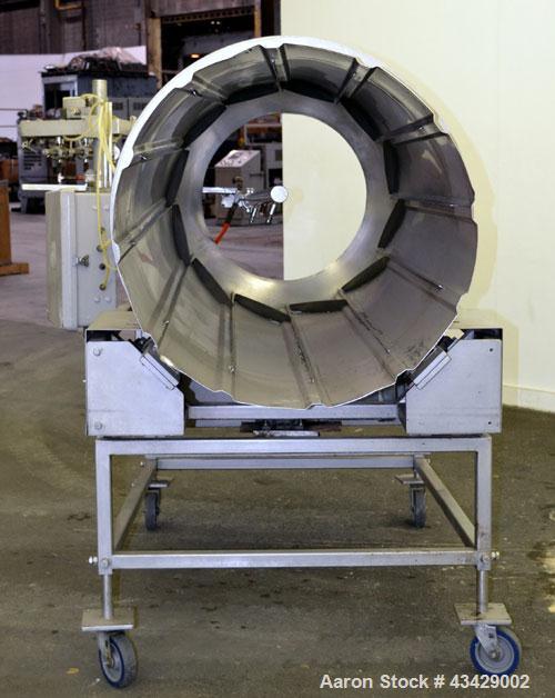 Used Spray Dynamite Rotary Drum Tumbler/Liquid Applicator, 304 Stainless Steel. 30" Diameter x 65" long horizontal drum with flights and lifters. 22-3/4" Diameter end feed opening with a 2" diameter ...