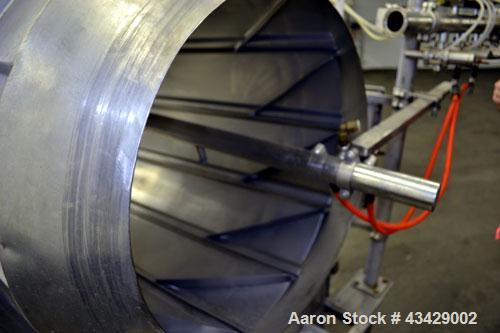 Used Spray Dynamite Rotary Drum Tumbler/Liquid Applicator, 304 Stainless Steel. 30" Diameter x 65" long horizontal drum with flights and lifters. 22-3/4" Diameter end feed opening with a 2" diameter ...