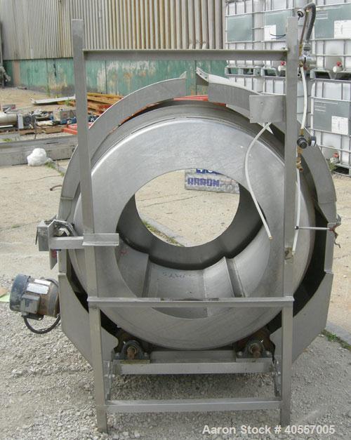 Used Coating drum, horizontal, 304 stainless steel. 38" diameter x 43" long, 24" feed opening, end discharge with removable hood. (6) Internal baffles. Driven by a 3/4 hp, 3/60/575 volt, 1725 rpm gea...