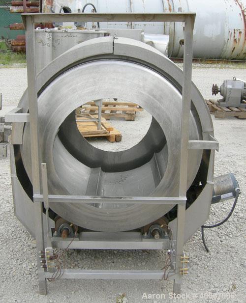 Used Coating drum, horizontal, 304 stainless steel. 38" diameter x 43" long, 24" feed opening, end discharge with removable hood. (6) Internal baffles. Driven by a 1/2 hp, 3/60/575 volt, 1725 rpm gea...