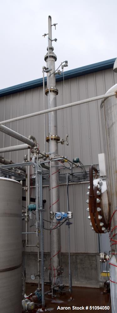 Used Scrubber Column, Stainless Steel, Vertical. (3) Bolt together sections approximate 10" diameter x 20' tall.