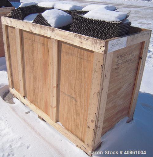 Used Koch-Glitsch Flexipac HC Structured Column Packing, approximate 5100 pounds, 29-4 heat resistant stainless steel. Restrict to low stress applications. Resists oxidation and high sulfur flue gas.