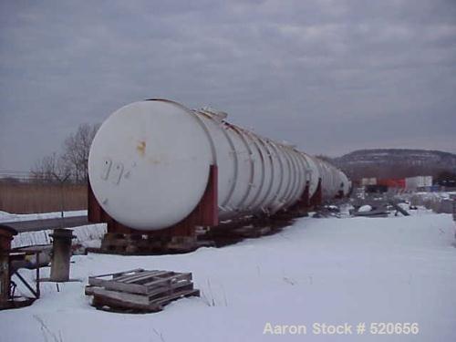 Unused-UNUSED: Kvaerner Process distillation column, approx 11' diameter x151' tall. Tray style with (120) 12 gauge 304 stainless steel trayspass, crossflow and slotted. Tray spacing 12". Rated 22.7 ...
