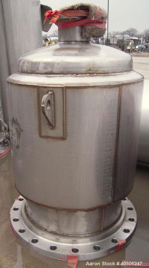 Unused- Mueller Distillation Column,  24" Methanol Distillation Column, C- 801, 304L Stainless Steel, Vertical. 24" diameter x 544" overall height, (4) bolt together sections, internal rated 40 psi a...