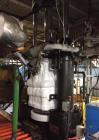 Used- 250 Ton Dry Ice Machine. Includes: (2) Baldwin block presses. (2) Jones Superior quarter block saws. Custom built conv...