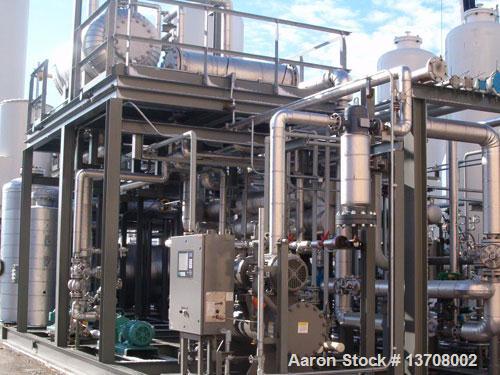 Used Hydrochem 1.4 MMSCFD Modular Hydrogen Gas Generating Plant. Product purity 99.999% product pressure 205 psig, natural gas feed 250 psig, export steam is available. Thirteen (13) catalyst tubes, ...