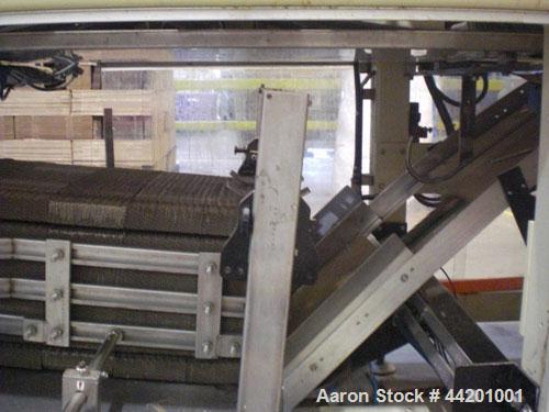 Used Can Filling Line for slim-line cans type 200/202, 150/250 ml.  Capacity 600 cans per minute.  Comprised of:  (1) Kettner depalletizer, (1) Vroemisse can conveyor, (1) Vroemisse rinser, (1) KHS H...