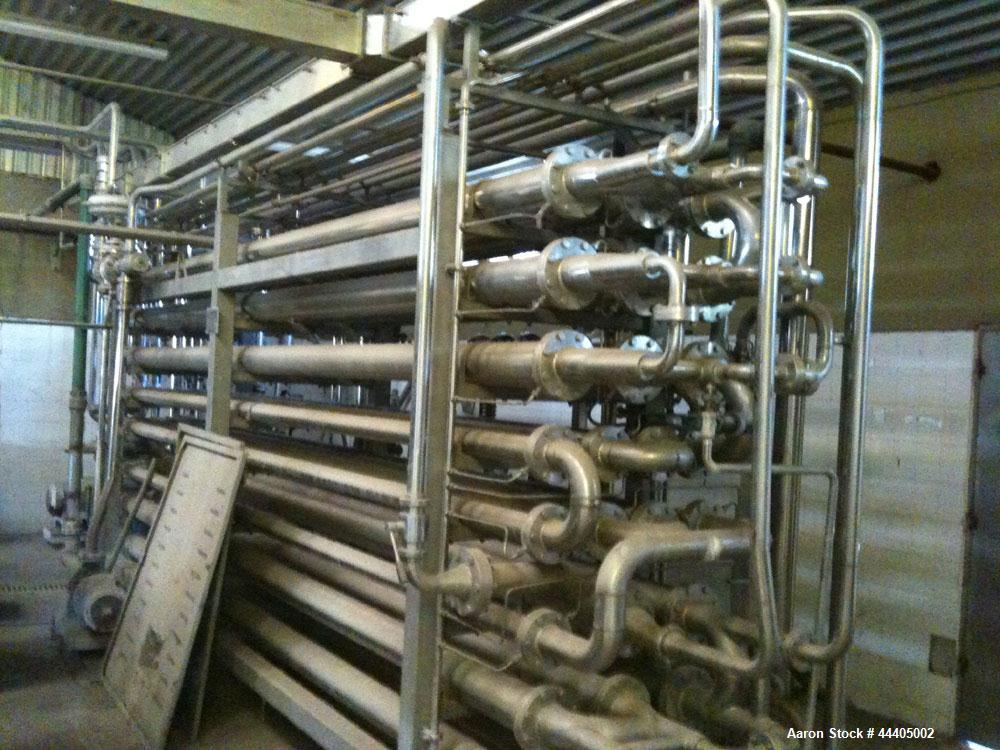 Used Tomato Paste Processing and Packaging Plant.  Approximate capacity 6 megatons/hour.  Comprised of tomato paste production line equipment, sorters, crackers, pumps, filters, preheaters, tanks, ev...
