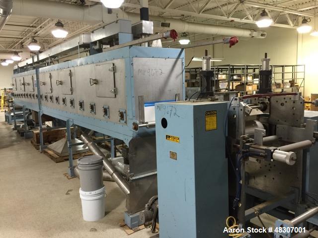 Used Lyons Pilot Coater/Laminator. 15" max coating width, 6" min. 30' oven, 304 SS, two zone, natural gas fired, 18" wide idler rolls. Nip fed three roll reverse roll coating station. Knife over roll...