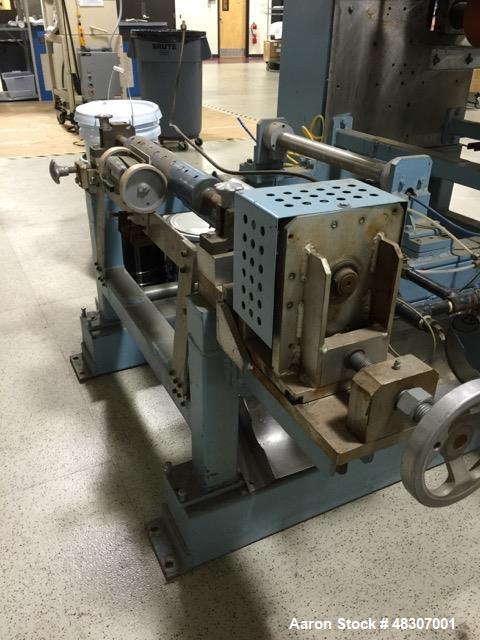Used Lyons Pilot Coater/Laminator. 15" max coating width, 6" min. 30' oven, 304 SS, two zone, natural gas fired, 18" wide idler rolls. Nip fed three roll reverse roll coating station. Knife over roll...