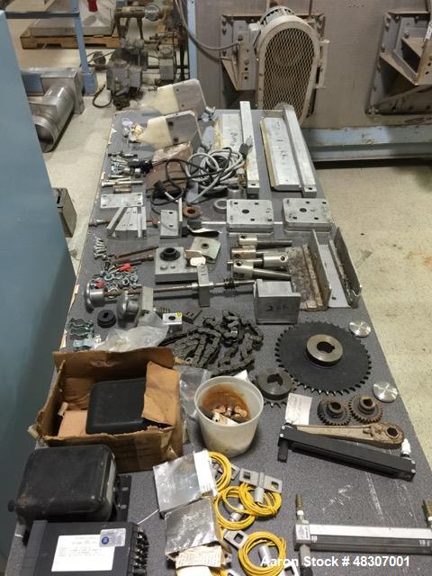 Used Lyons Pilot Coater/Laminator. 15" max coating width, 6" min. 30' oven, 304 SS, two zone, natural gas fired, 18" wide idler rolls. Nip fed three roll reverse roll coating station. Knife over roll...