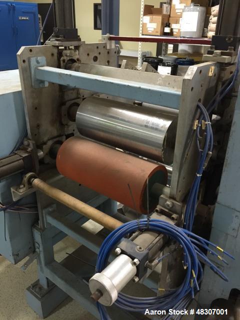 Used Lyons Pilot Coater/Laminator. 15" max coating width, 6" min. 30' oven, 304 SS, two zone, natural gas fired, 18" wide idler rolls. Nip fed three roll reverse roll coating station. Knife over roll...