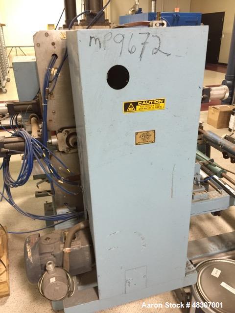 Used Lyons Pilot Coater/Laminator. 15" max coating width, 6" min. 30' oven, 304 SS, two zone, natural gas fired, 18" wide idler rolls. Nip fed three roll reverse roll coating station. Knife over roll...