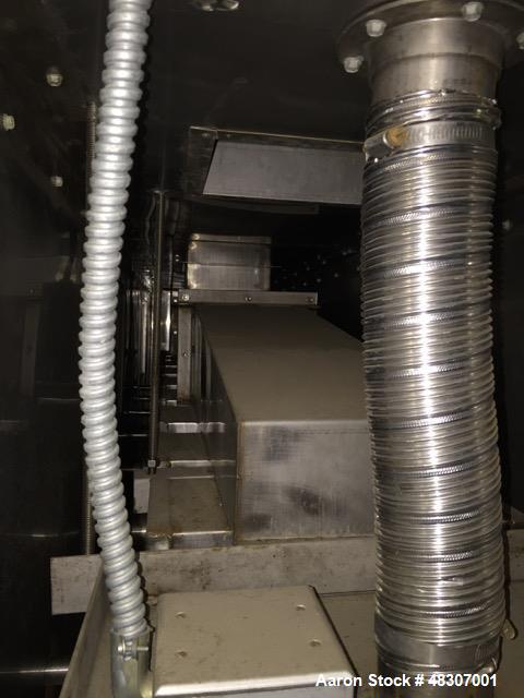 Used Lyons Pilot Coater/Laminator. 15" max coating width, 6" min. 30' oven, 304 SS, two zone, natural gas fired, 18" wide idler rolls. Nip fed three roll reverse roll coating station. Knife over roll...