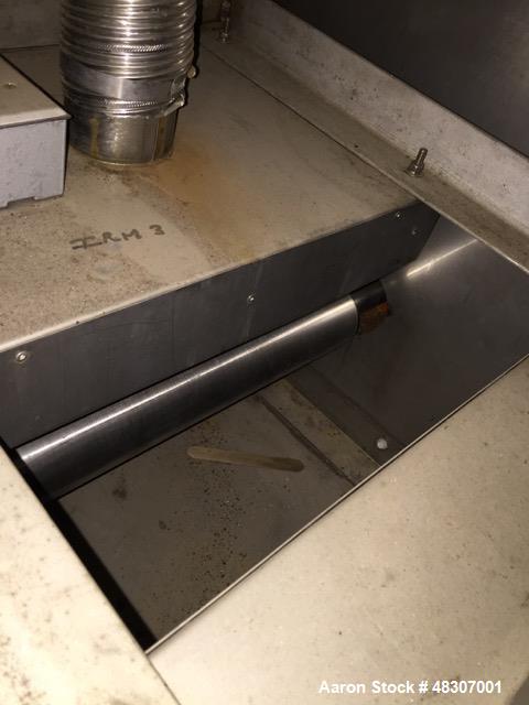 Used Lyons Pilot Coater/Laminator. 15" max coating width, 6" min. 30' oven, 304 SS, two zone, natural gas fired, 18" wide idler rolls. Nip fed three roll reverse roll coating station. Knife over roll...
