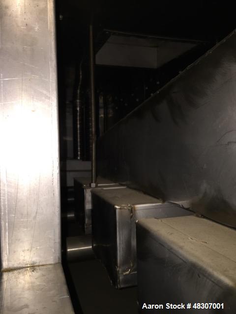 Used Lyons Pilot Coater/Laminator. 15" max coating width, 6" min. 30' oven, 304 SS, two zone, natural gas fired, 18" wide idler rolls. Nip fed three roll reverse roll coating station. Knife over roll...